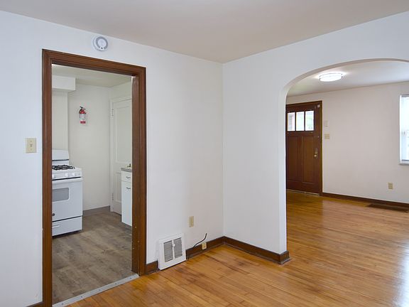 Kitchen right off dining area with all new luxury vinyl plank flooring