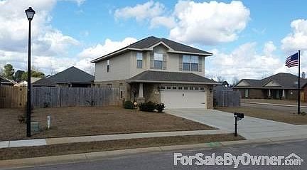 Wide driveway
						:
						Extended width driveway, no getting out of vehicles onto the grass