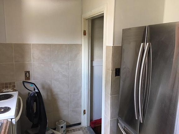 New tile, new fridge in kitchen