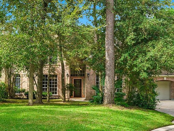 Abundance of natural landscaping enhances the beauty of the home -