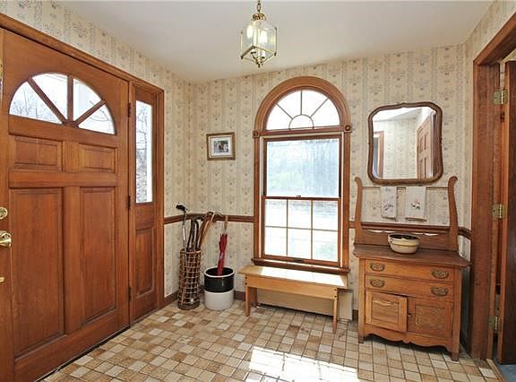 The spacious entry foyer welcomes you into this home.