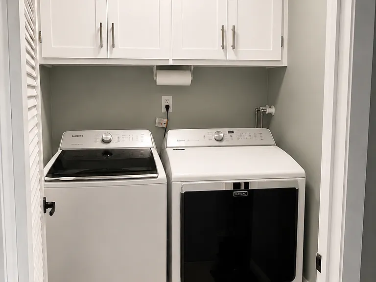 Laundry room with xl water and dryer