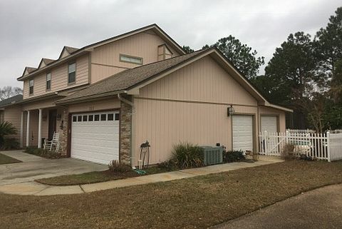 Garage with golf cart door