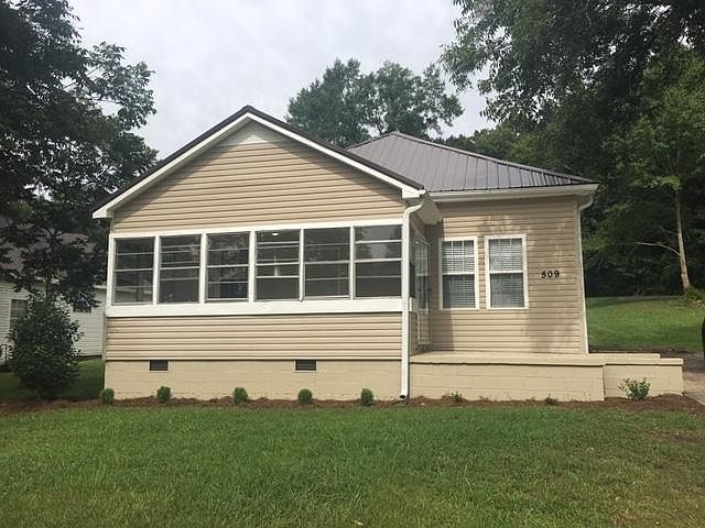 509 27th St N - New metal roof, fresh paint, newly landscaped.