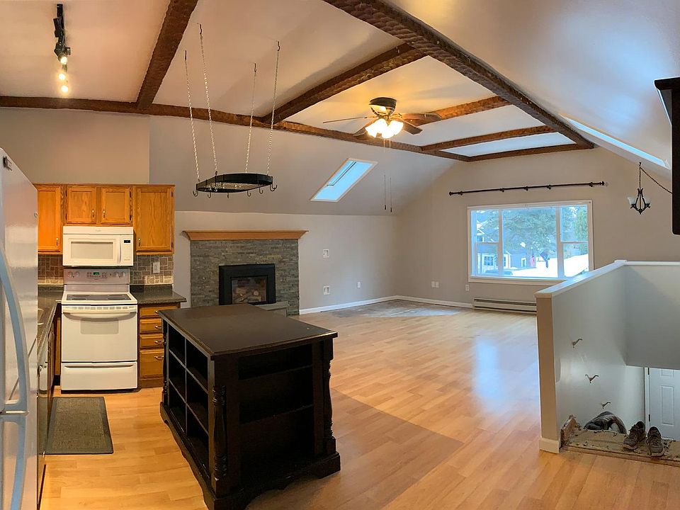 Kitchen/Great room. stairs and TV area have been re-carpeted. Lot s of natural light.