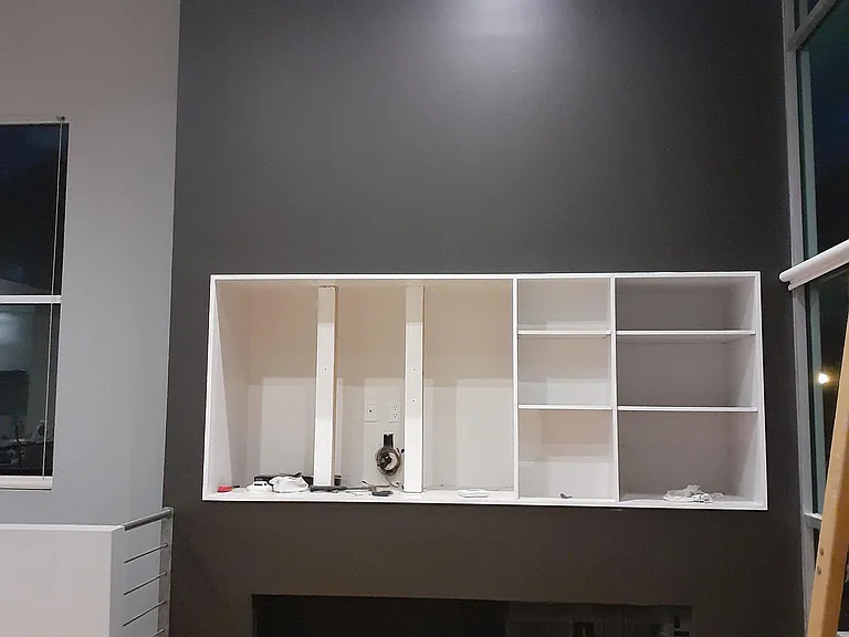 This is the new color scheme of light gray walls with charcoal and pure white accents.