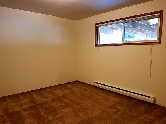 Spacious bedroom with good sized closet.