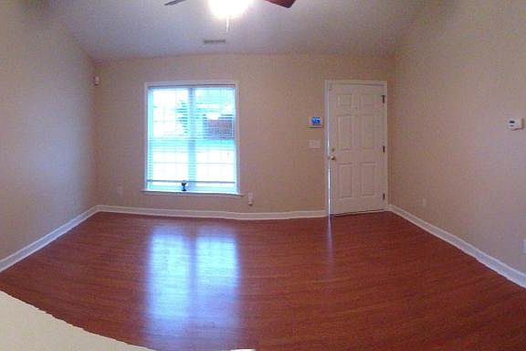 Living room in front of home with TV niche