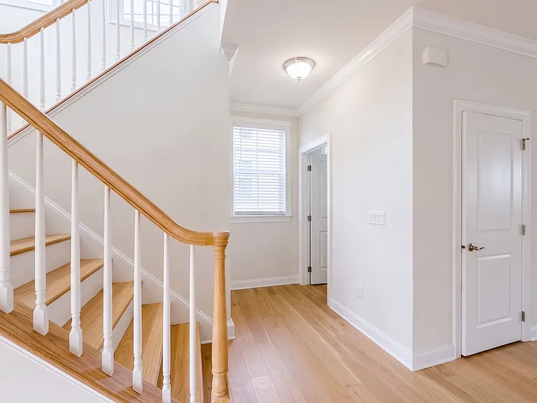 The details and finish of the beautiful hardwood throughout brings natural warmth to this modern home.