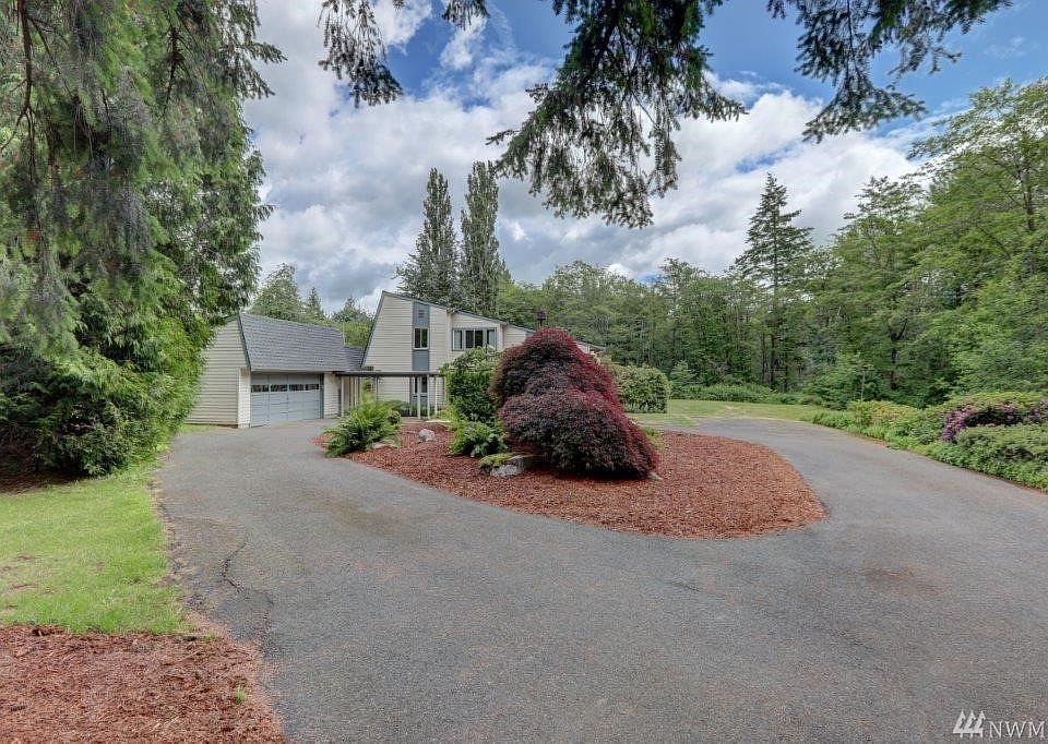 This home is located in Ferndale, WA, just north of Bellingham, WA. Architecturally designed 4 level home with  4BD & 3.5BA on 5