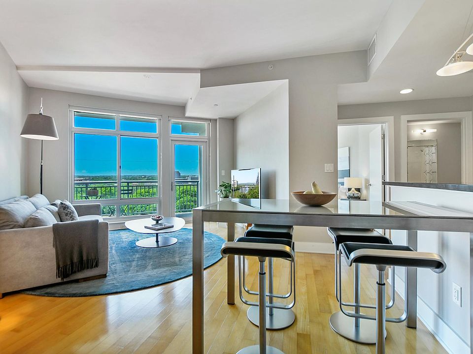 The great room features high ceilings and a bright layout.