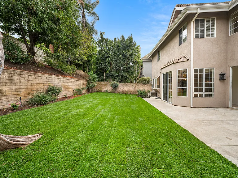 Private Backyard with Lush Grass