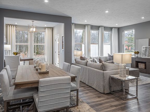 Open Concept Layout Featuring the Dining Room, Gathering Room and Kitchen