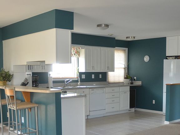 Kitchen area with breakfast bar