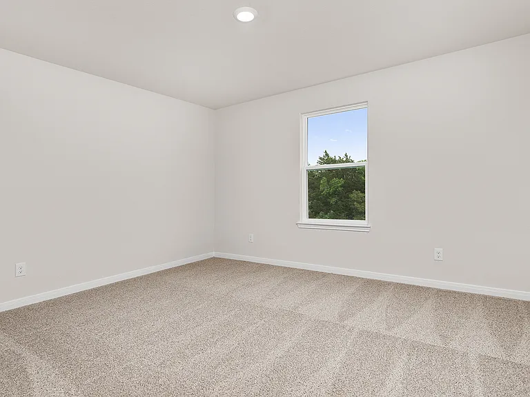 The secondary bedrooms are a great space for a children's bedroom, guest room, or home office.