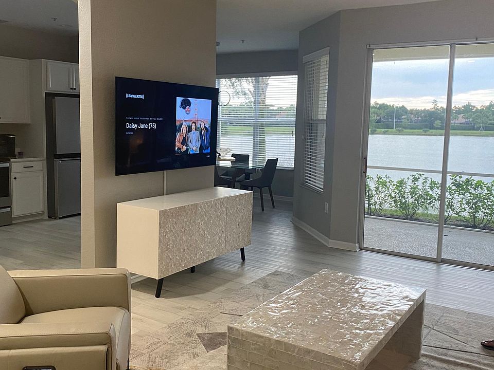 Family room with the lake in the background.