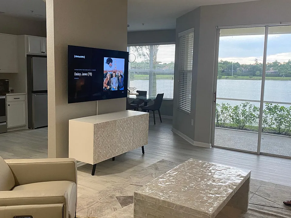 Family room with the lake in the background.