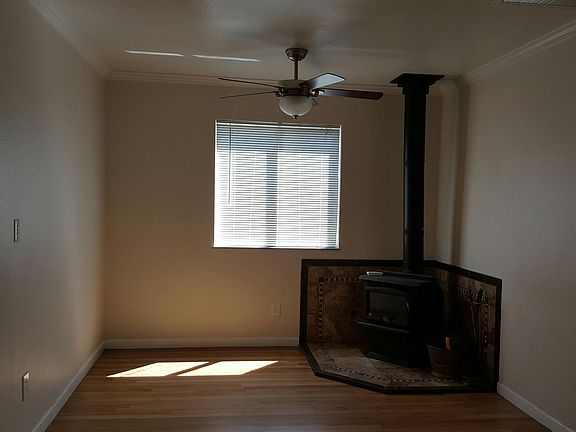dining area with wood burning stove