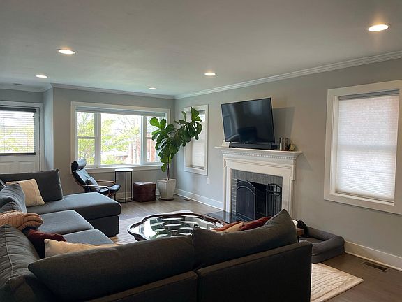 Large living room with fireplace.