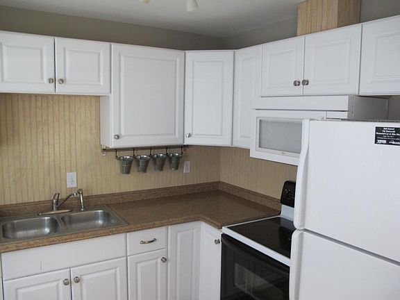 Remodeled kitchen with built in microwave/range hood
