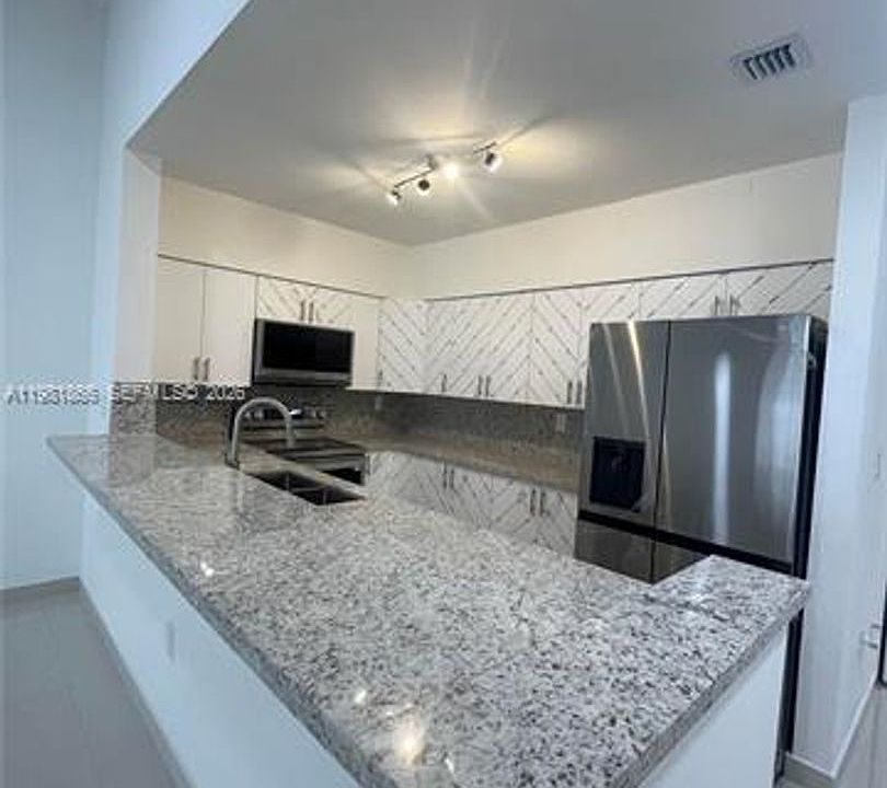 1st image of 14728 Balgowan Rd #Townhouse 14728