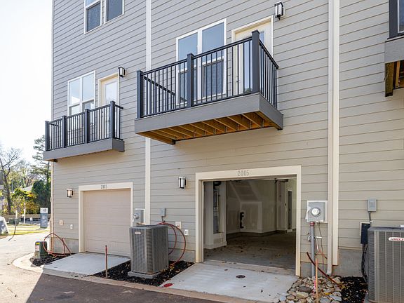 Evans Exterior 6 features siding, brick, covered front door and 1-car tandem rear load garage