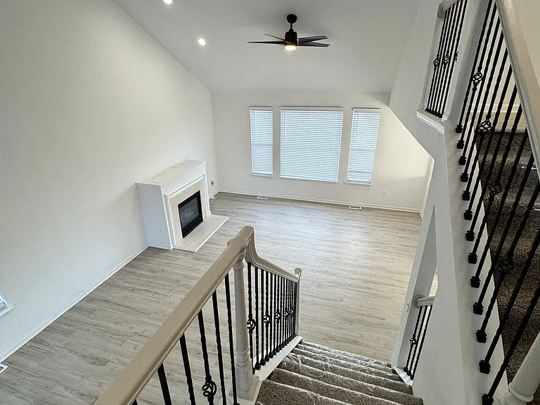 view of back of great room from mid level landing