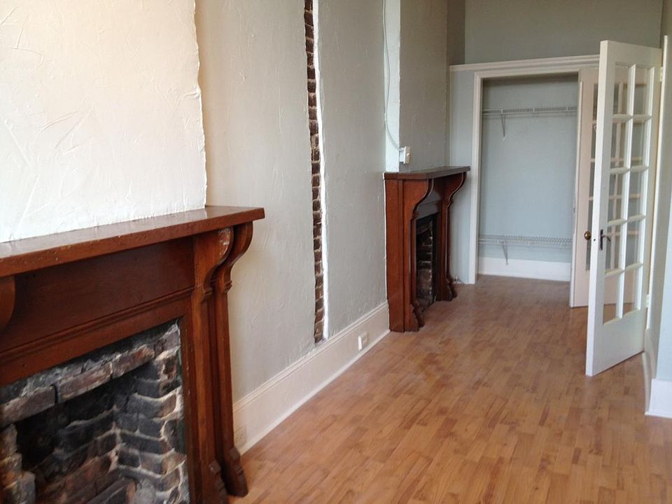 Bedroom 2 -- Same amazing windows and light and with TWO fir