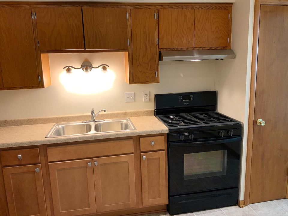 Kitchen with new counter, sink and cabinets