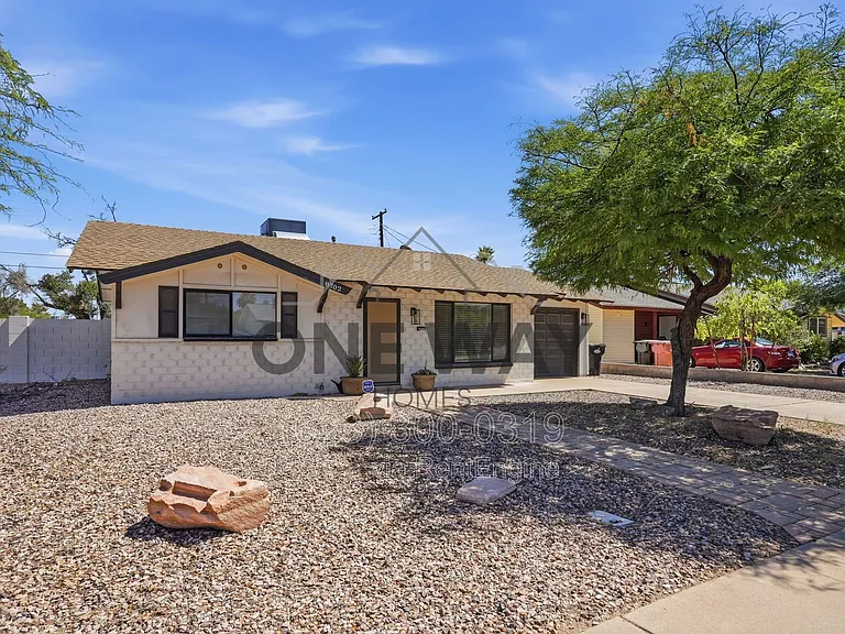 8702 E Sheridan St — Photo 2