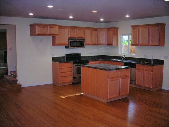 Granite countertops, island, bamboo floors