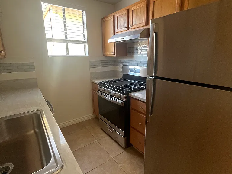 Kitchen - New Stainless Refrigerator/Range/Dishwasher
Quartz Countertops