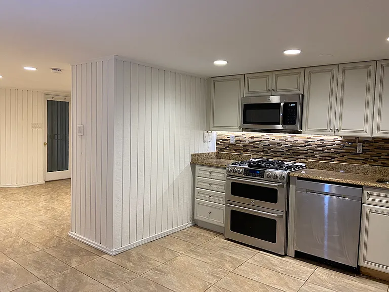 Kitchen and part of living room.