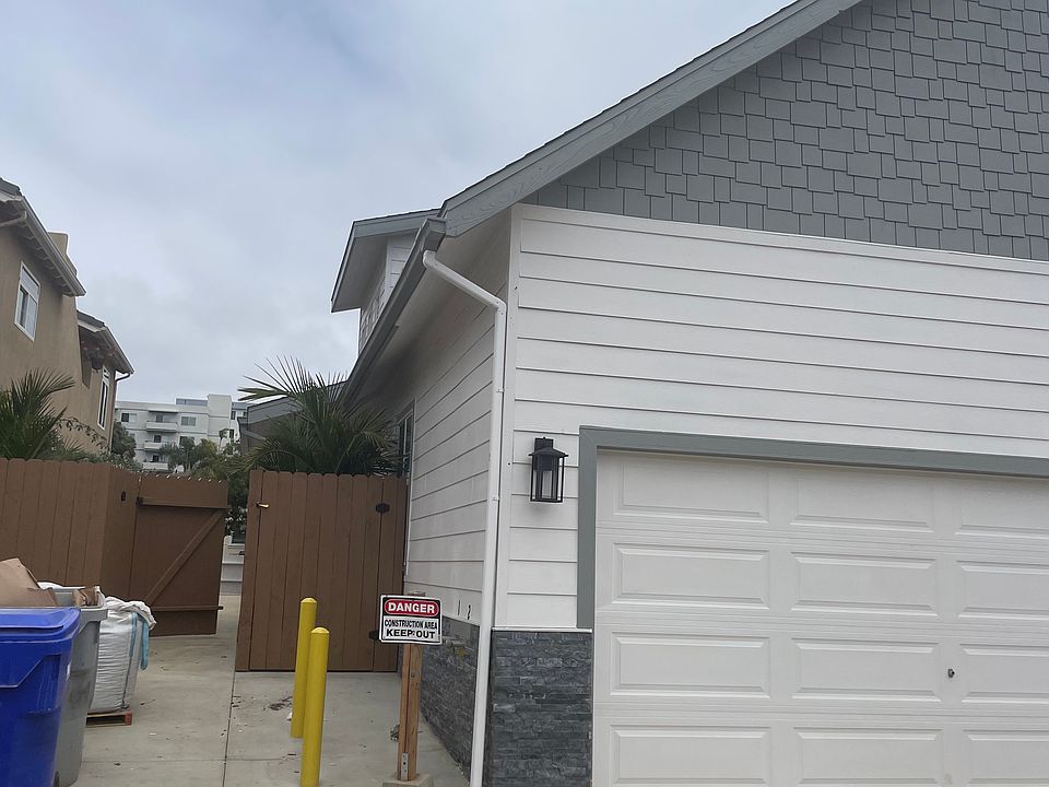 2 Car Garage with EV Charger, and additional off street parking area
