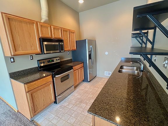 Kitchen with stainless steel appliances, granite counter tops