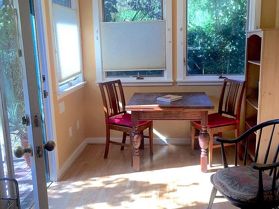 Oak table and chairs in dining/front area