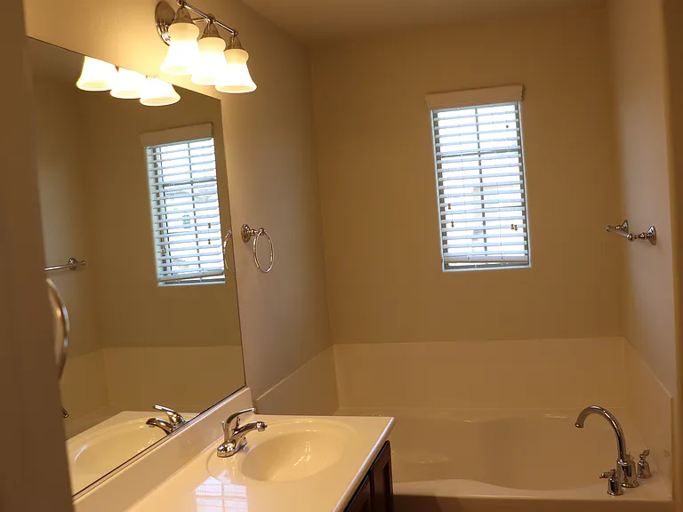 Private bathtub in the master bathroom.