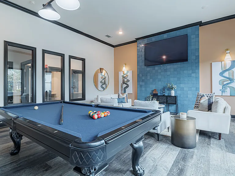 Clubhouse with billiard table and television, perfect for social gatherings