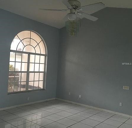 Living/Great room with vaulted ceiling*