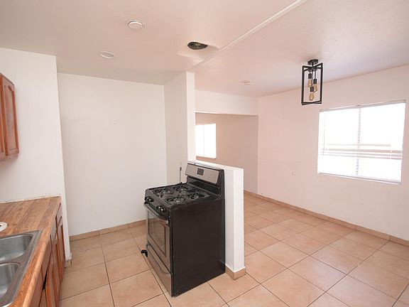 Kitchen With Stainless Steel Stove