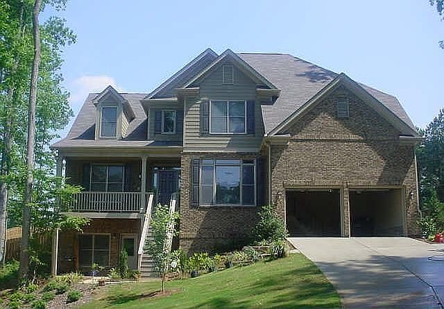 BRICK BEAUTY WITH FRONT PORCN AND LOWER LEVER TERRACE OFF BASEMENT