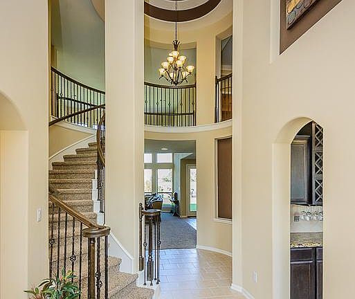 BREATH TAKING ENTRYWAY WITH ROTUNDA CEILING.