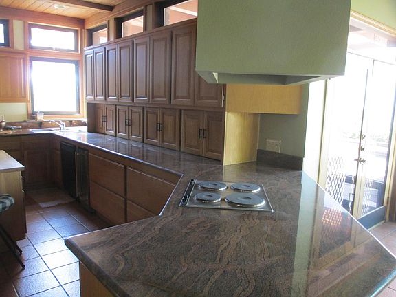 Second electric range with wraparound counter
