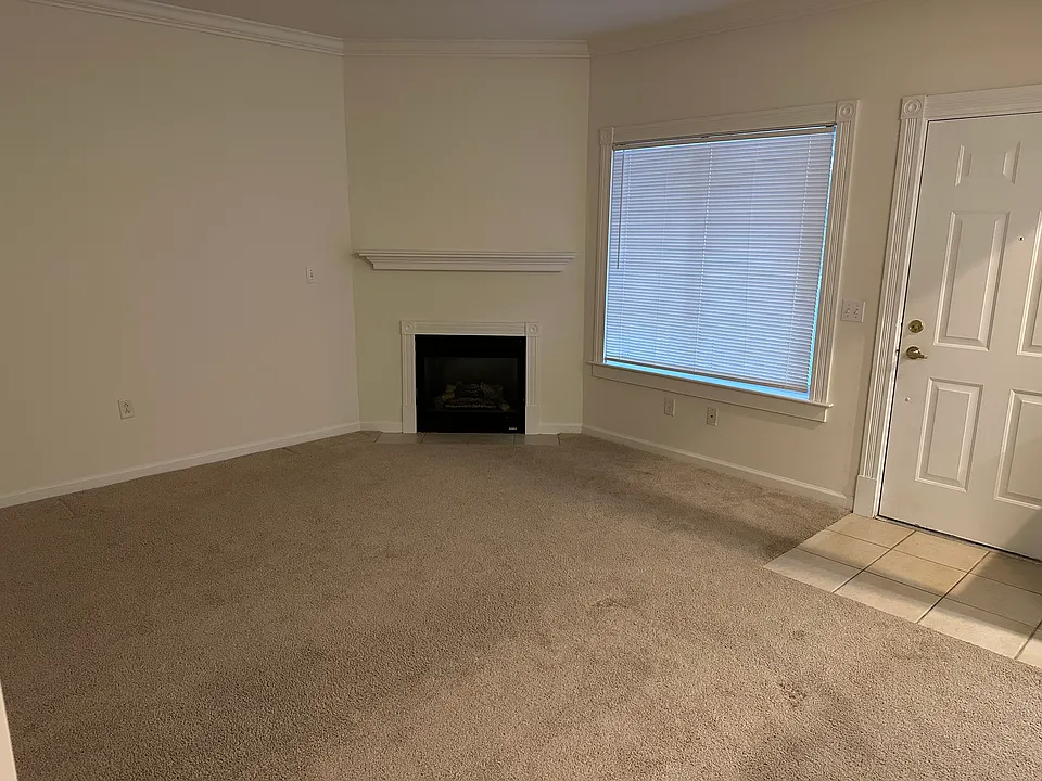 Living room with gas fireplace.