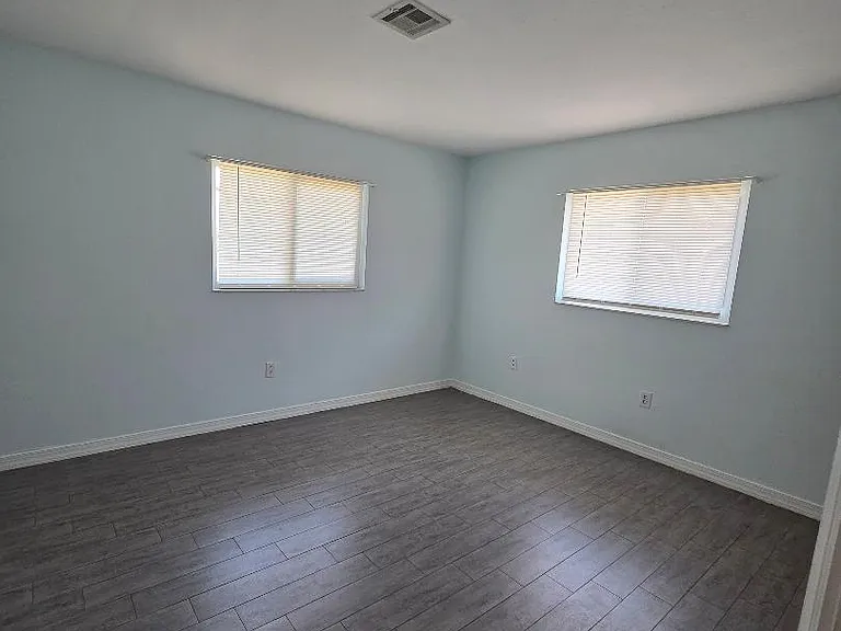 Guest Bedroom is Private with Walk in Closet an Separate Bath with shower and tub