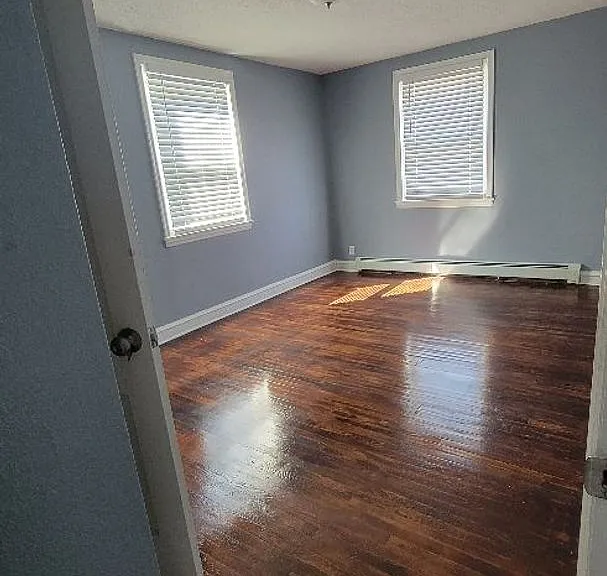 7703 Woolston Ave — Photo 9