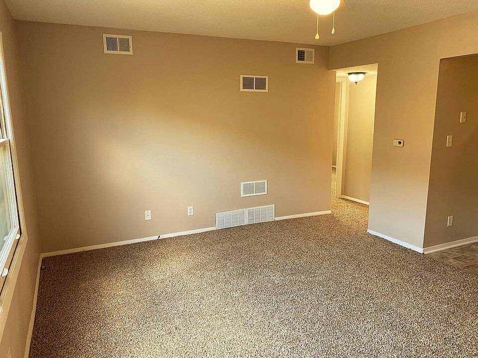 Spacious, bright living room with lovely new floors and heaps of streaming natural light!