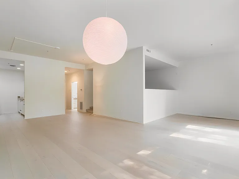 Open office/guest space surrounded with living area.