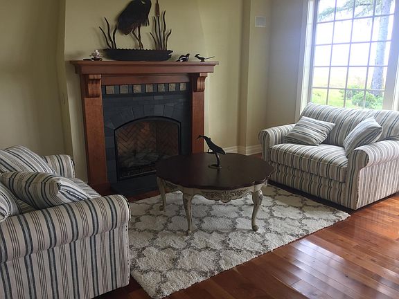 Cozy fireplace with bay view