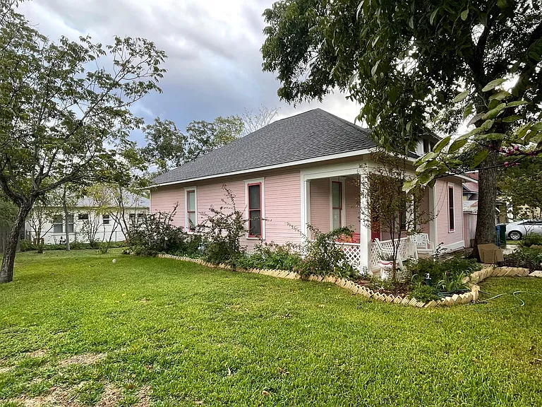 The west side of house and yard.